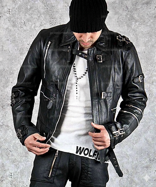 Person wearing a black leather jacket and white shirt with 'Wolves' text on a gray background